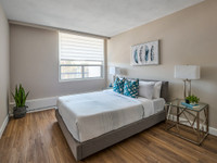 Set on leafy, well-maintained grounds a short walk from the Rideau River in Ottawa South, the Faircr... (image 3)
