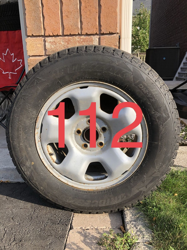 112: BRIDGESTONE 245/65R17 WINTER TIRES ON RIMS in Tires & Rims in Oakville / Halton Region