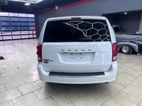 The 2019 Dodge Grand Caravan Canada Value Package in pristine white is the perfect blend of practica... (image 5)
