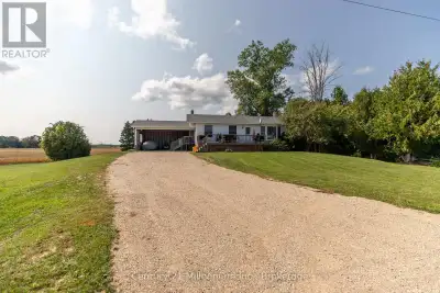 Welcome to this beautifully updated bungalow set on a large 1+ acre lot, surrounded by open farmland...