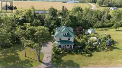 Incredible home, built in 1927, & restored with intricate details in 2011! Stunning flowers, shrubs...