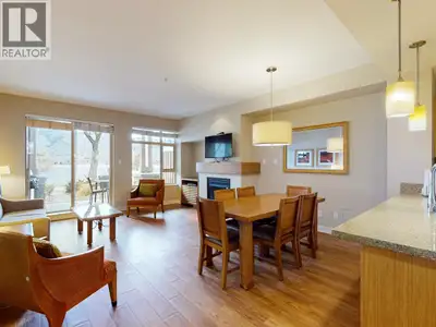 BEACHFRONT LIVING AT WATERMARK BEACH RESORT! Step directly from the shores of Osoyoos Lake into this...