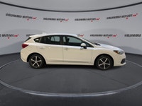 Meet a smart, confidence-inspiring compact that fits Canadian roads in every season. This used 2023... (image 8)