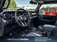Conquer any terrain with this 2023 Jeep Wrangler Sahara Altitude, a fresh trade-in boasting a striki... (image 9)