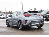 The 2019 Hyundai Veloster Turbo is a sporty and stylish hatchback that combines bold design with exc... (image 6)