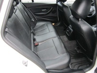 ALL WHEEL DRIVE WAGON. FINISHED IN ARTIC WHITE WITH BLACK LEATHER INTERIOR. ALLY WHEELS WITH NEW TIR... (image 8)