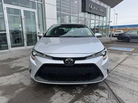 This 2022 Toyota Corolla LE is ready for action from every angle. Sleek J-shaped bi-beam LED headlam... (image 4)