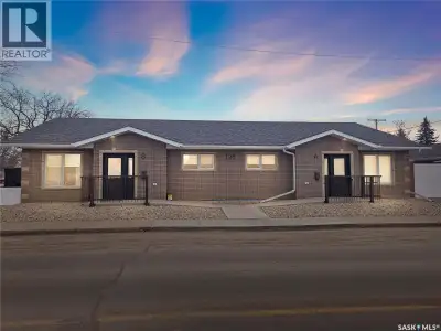 Truly one of a kind, this custom-built, all-brick, bungalow-style duplex offers 2,460 sq. ft. total...