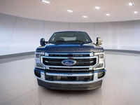 // EXCELLENT CONDITION! // Meet the 2022 Ford Super Duty F-350 SRW Lariat, now offered at Centennial... (image 1)