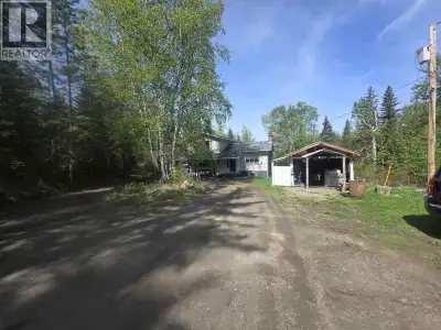 Over seven acres with a well-built 5-level split-home with a view of Dragon Lake. Two kitchens will...
