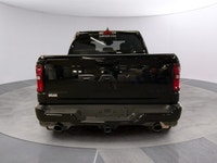 The 2026 Ram 1500 Big Horn 4x4 Crew Cab in a striking black exterior combines rugged durability with... (image 3)