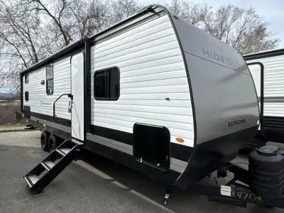 Keystone Hideout travel trailer 262BHS highlights: Front Private Bedroom 20' Power Awning with LED L...