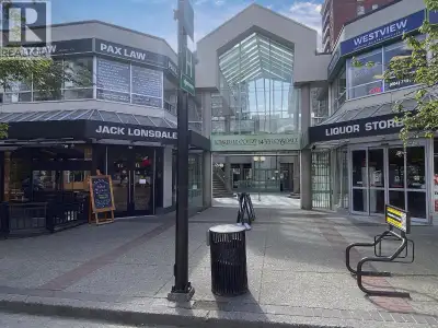 Uniquely positioned 452 square foot second level courtyard facing strata unit with 22' of storefront...