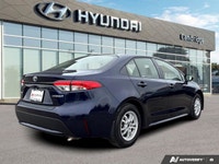 This Toyota Corolla delivers a Gas/Electric I-4 1.8 L/110 engine powering this Variable transmission... (image 4)