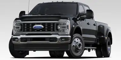 Introducing the 2026 Ford Super Duty F-450 DRW Lariat, a powerhouse wrapped in a striking star white...