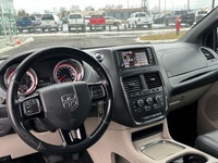 This 2017 Dodge Grand Caravan Certified, finished in Gray, offers practical family transportation at... (image 9)