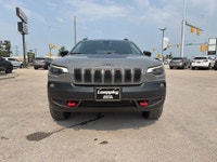 2022 Jeep Cherokee Trailhawk Elite Available Now at Loeppky Auto Sales Take on every adventure in co... (image 7)