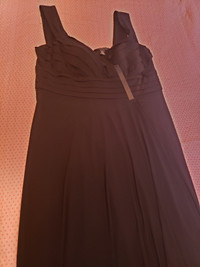 Black long gown. Brand new with tags. Size 14. Excellent shape.