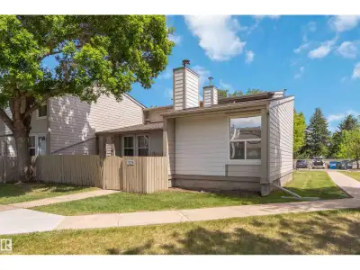 Charming bungalow-style townhouse in vibrant Ekota! This 2-bed, 1-bath end unit offers privacy, a fe...