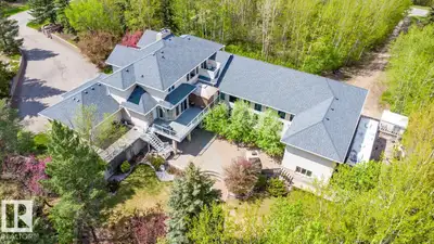 Nestled on a private, picturesque 2.01 acres in prestigious Windsor Estates, this 6900+ sqft estate...
