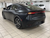 Rush-hour traffic slows to a crawl, but the cabin around you feels more like a modern tech lounge th... (image 3)