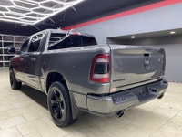 The 2022 Ram 1500 Sport 4x4 Crew Cab in a striking gray exterior is a vehicle crafted for those who... (image 5)