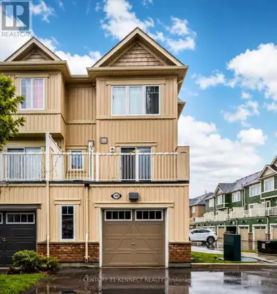 ** Rare End-Unit Townhome ** offering close to 1,400 sq ft of bright and functional living space in...