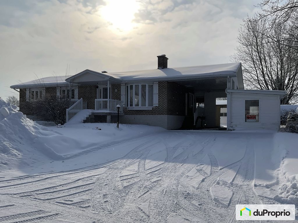 $599,000 - Bungalow for sale in St-Hyacinthe (St-Thomas-D'Aquin) — photo 1