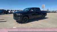 This Dealership Service Loaner Demo 2025 RAM 1500 Warlock 4x4 Crew Cab 57 Box has the 3.0L I6 Hurric... (image 2)