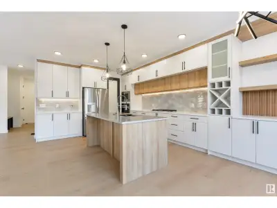 Your dream home, nestled on a spacious pie-shaped lot in a quiet cul-de-sac, is now complete! This e...