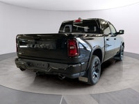 Experience the power and capability of the 2026 Ram 1500 Big Horn in a striking black finish. This 4... (image 4)
