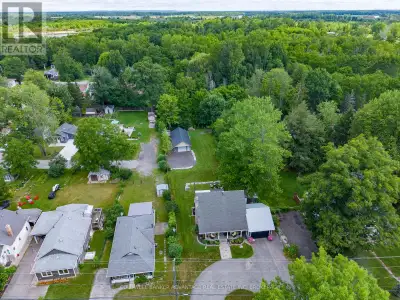 It's all here for you! This 2-storey home sits on a beautiful 70 ft x 300 ft deep lot offering priva...