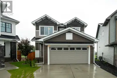 Welcome to 311 Monterey Place SE in beautiful High River, Alberta, where the pace is slower, the ski...