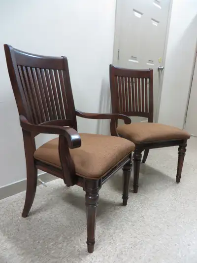 A Pair of Solid Wood Chairs, View more