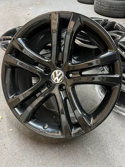 Stunning set of original VW Tiguan wheels in gloss black finish. They will fit other VW models, plea...
