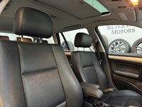 This 2002 BMW 325i Wagon is an excellent example of a clean, well-kept BMW E46 Touring. Showing just... (image 7)
