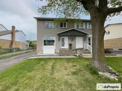 Maison jumelée moderne et clé en main avec design unique à vendre dans un secteur recherché de Bross...