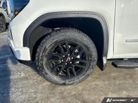 The 2026 GMC Sierra 1500 Elevation in a striking White finish is the perfect combination of power an... (image 6)