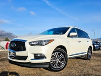 The 2017 INFINITI QX60 AWD in elegant white is a true performer with its reliable all-wheel drive an... (image 7)