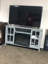 roku smart tv and stand with fireplace
