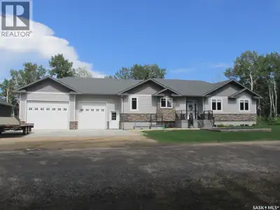 Welcome to the stunning lake home at 214 Hillside Drive, Tobin Lake, SK! This executive style 1975 s...