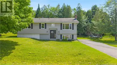 Welcome to 23 Country Crescent, a beautifully updated split-entry home on a private corner lot in th...