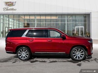 The 2021 Cadillac Escalade includes a panoramic sunroof, power-retractable running boards, hands-fre... (image 5)
