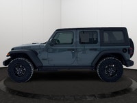 This 2026 JEEP WRANGLER 4-DOOR SPORT has the following options Cloth Low-Back Bucket Seats, Remote S... (image 1)