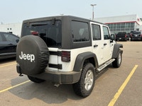 3.6L V6 engine with manual transmission - 4x4 drive for all-terrain capability - Cloth interior with... (image 6)