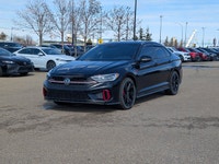 This pre-owned 2023 Volkswagen Jetta GLI Manual is finished in Black, offering a clean and sporty ap... (image 1)