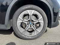 Command attention and experience agile driving in the 2025 BMW X1 xDrive28i. This dynamic Sport Util... (image 8)