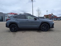 The pre-owned 2024 Subaru Crosstrek Onyx in Blue with a Grey interior delivers rugged versatility, m... (image 7)