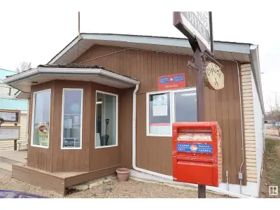 Located on Lake Drive at Mulhurst Bay, overlooking Pigeon Lake. 2029 sq. ft. retail building built i...