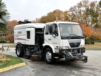 2009 Nissan Diesel UD 3300 44,867 MILES / 72,206 KILOMETERS Air Brakes Elgin Crosswind Sweeper Dual...